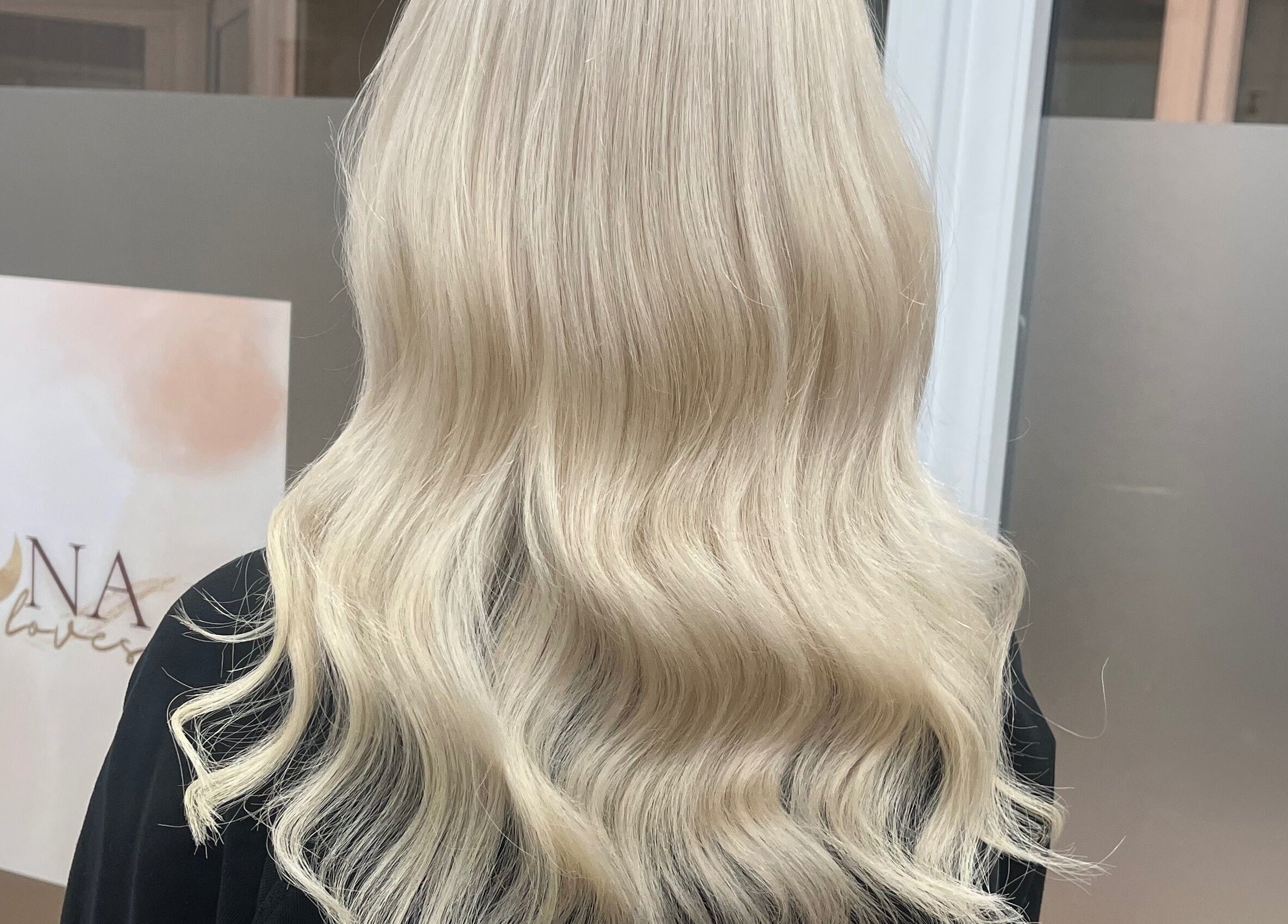 Blonde wavy hairstyle showcase at Bethany Jade Hairdressing, Cannock, England, GB.