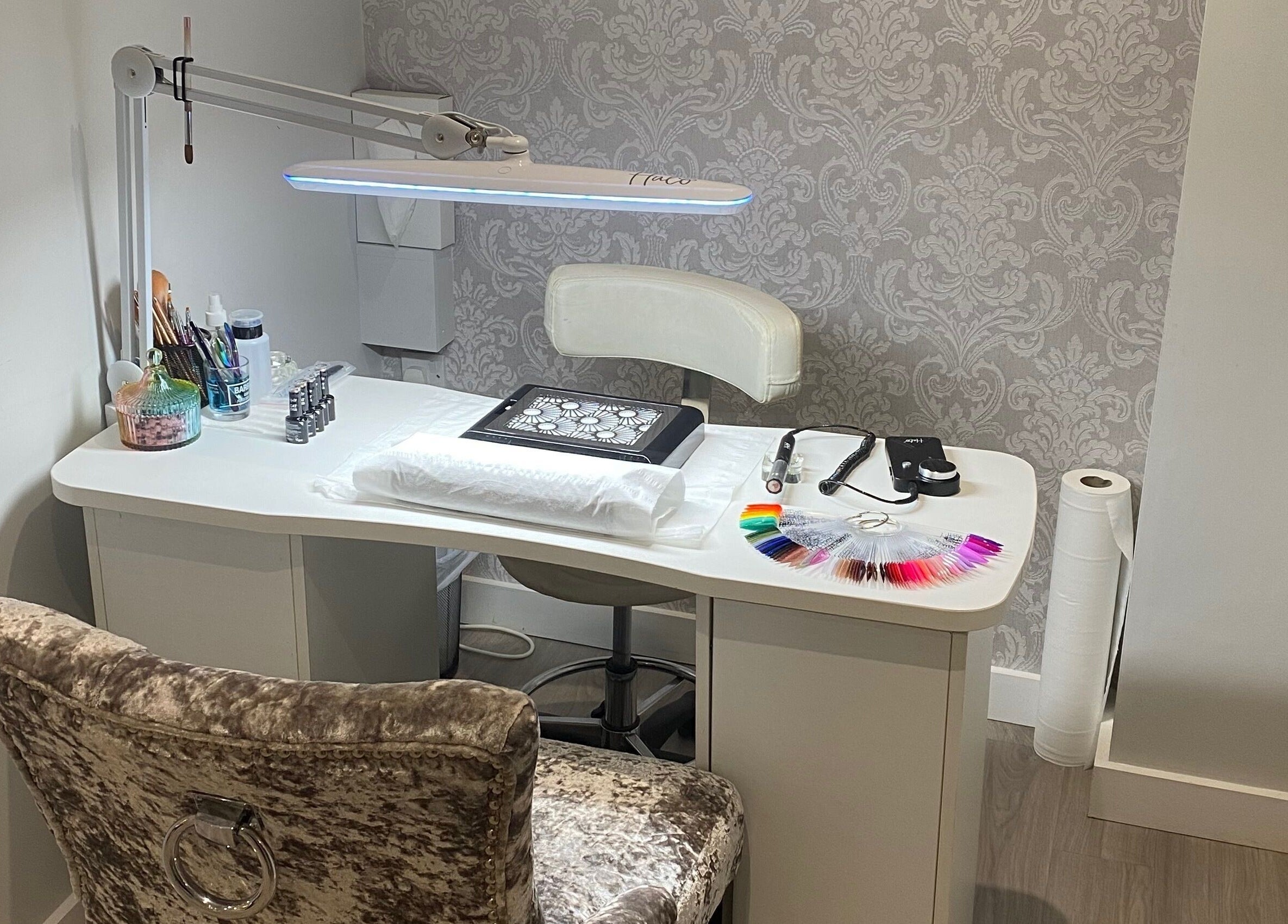 Manicure station at Nails and More at No.4, Ross-on-Wye, England, GB, showcasing elegant design.
