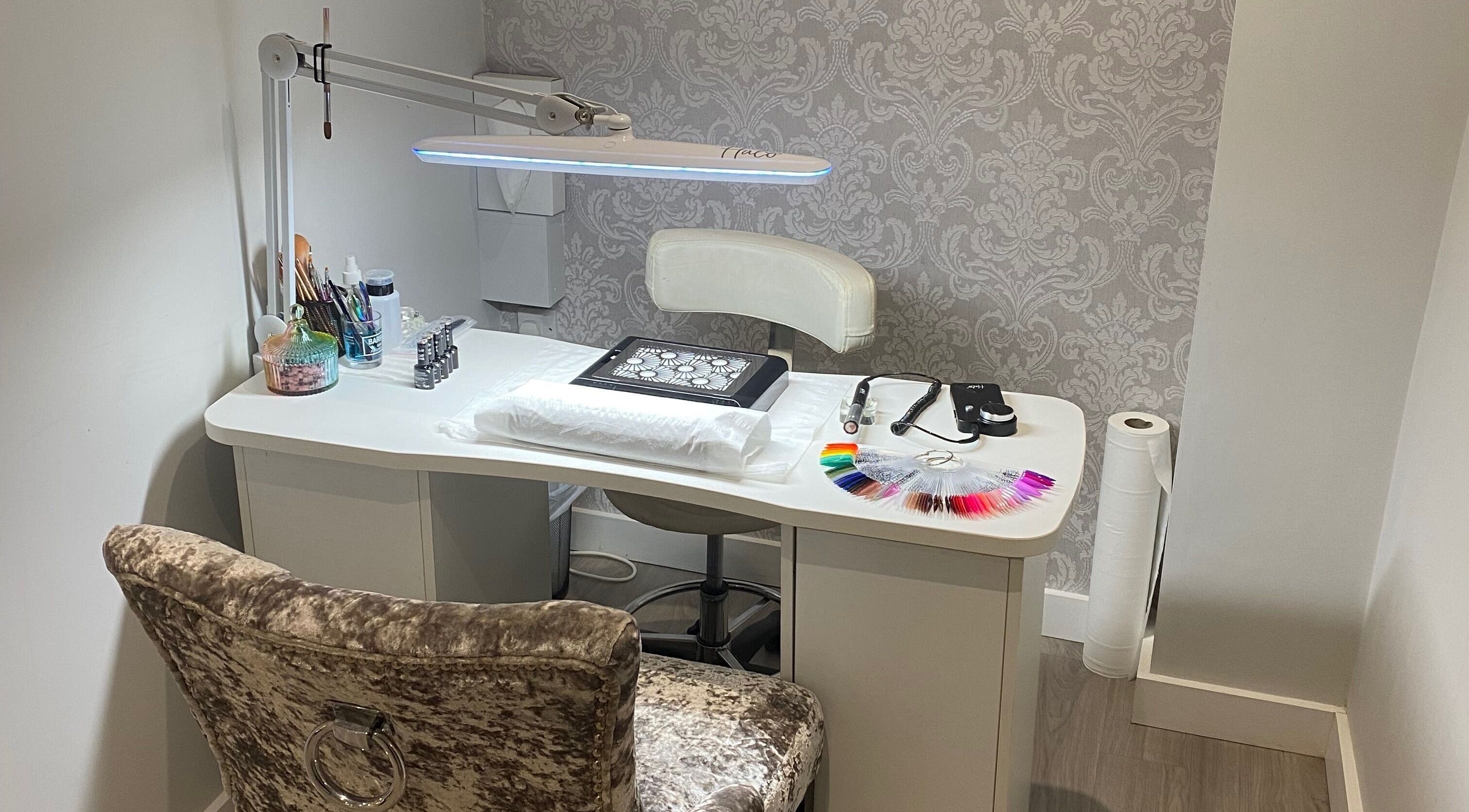 Manicure station at Nails and More at No.4, Ross-on-Wye, England, GB, showcasing elegant design.