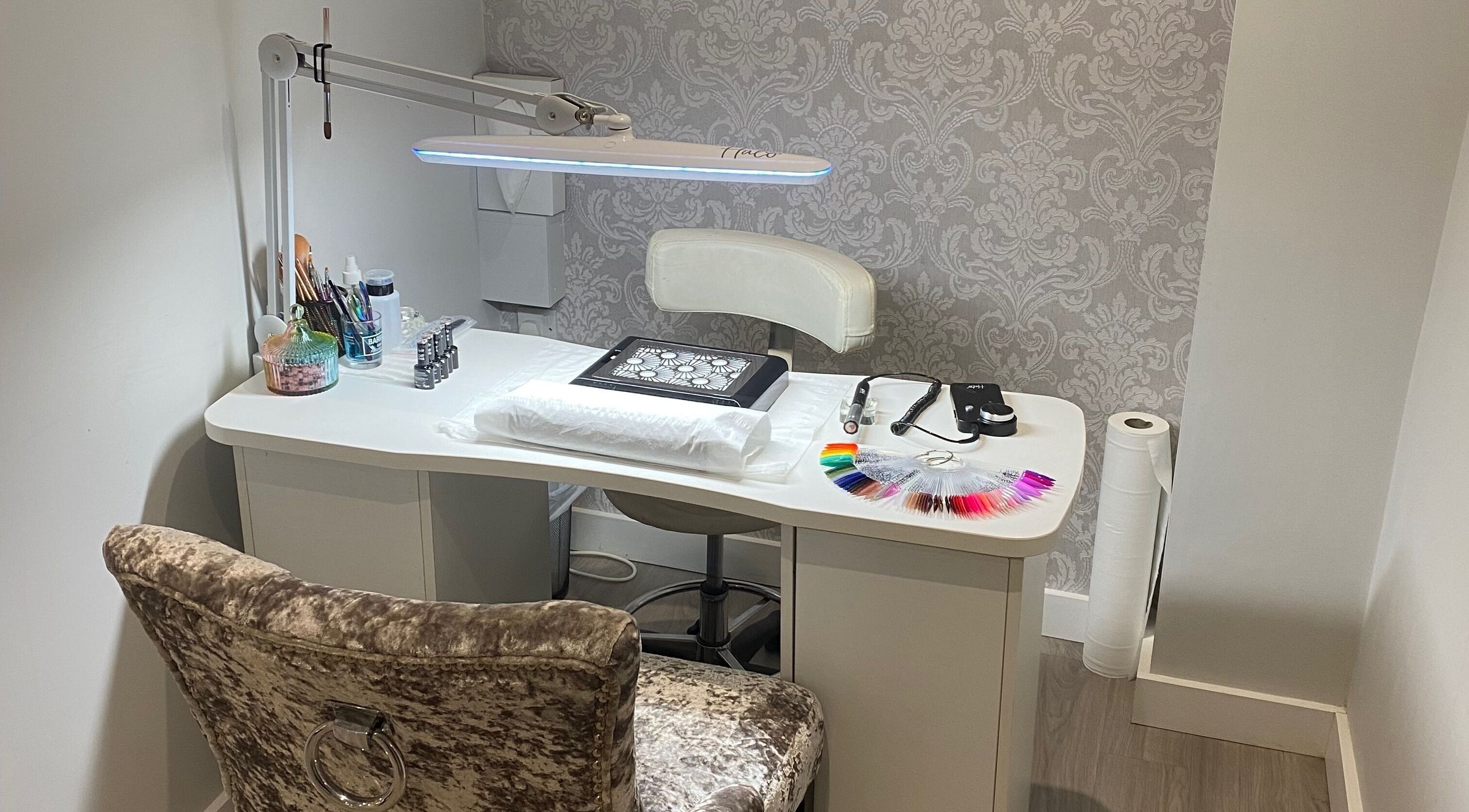 Manicure station at Nails and More at No.4, Ross-on-Wye, England, GB, showcasing elegant design.
