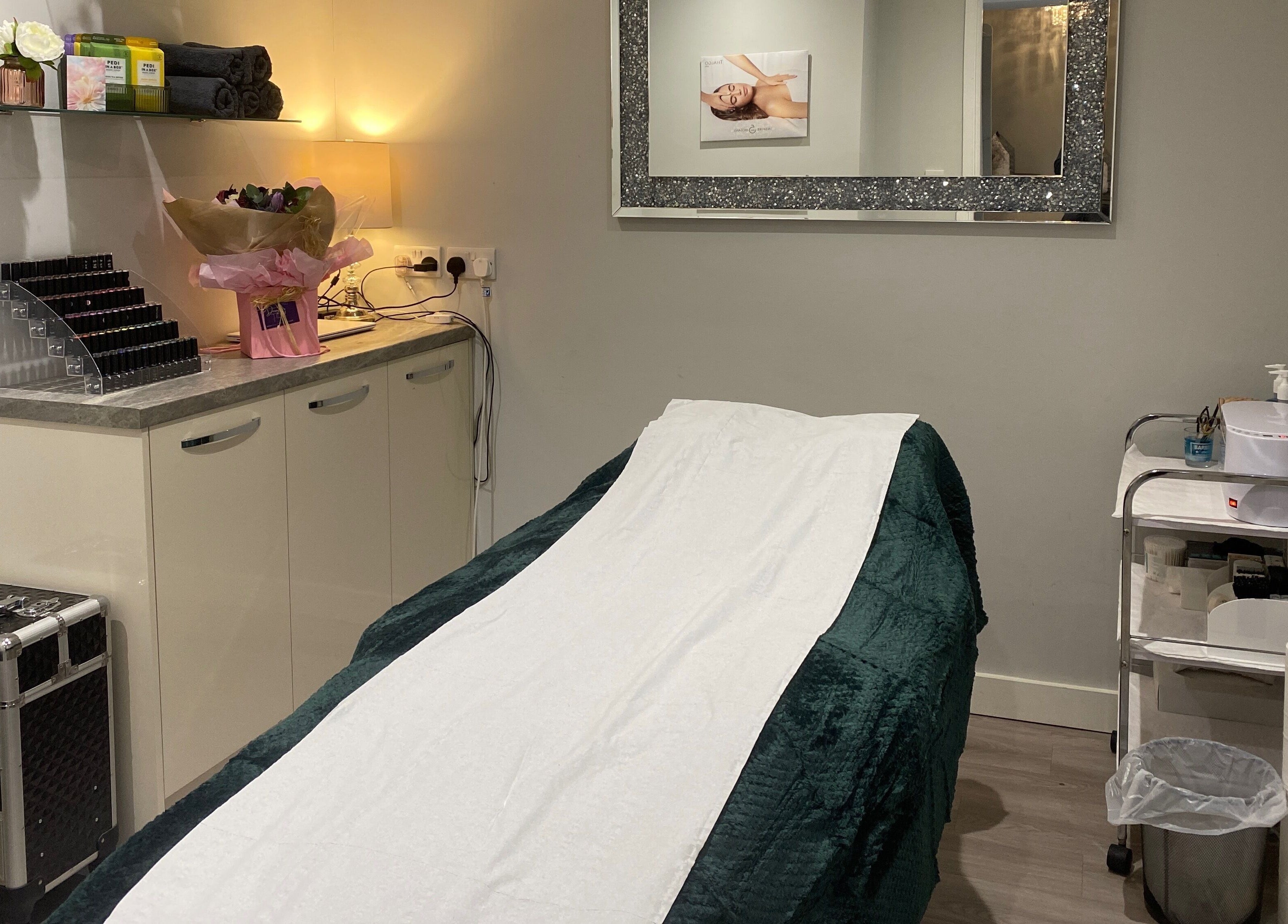 Relaxing spa treatment room at Nails and More at No.4, Ross-on-Wye, England, GB, with massage table.