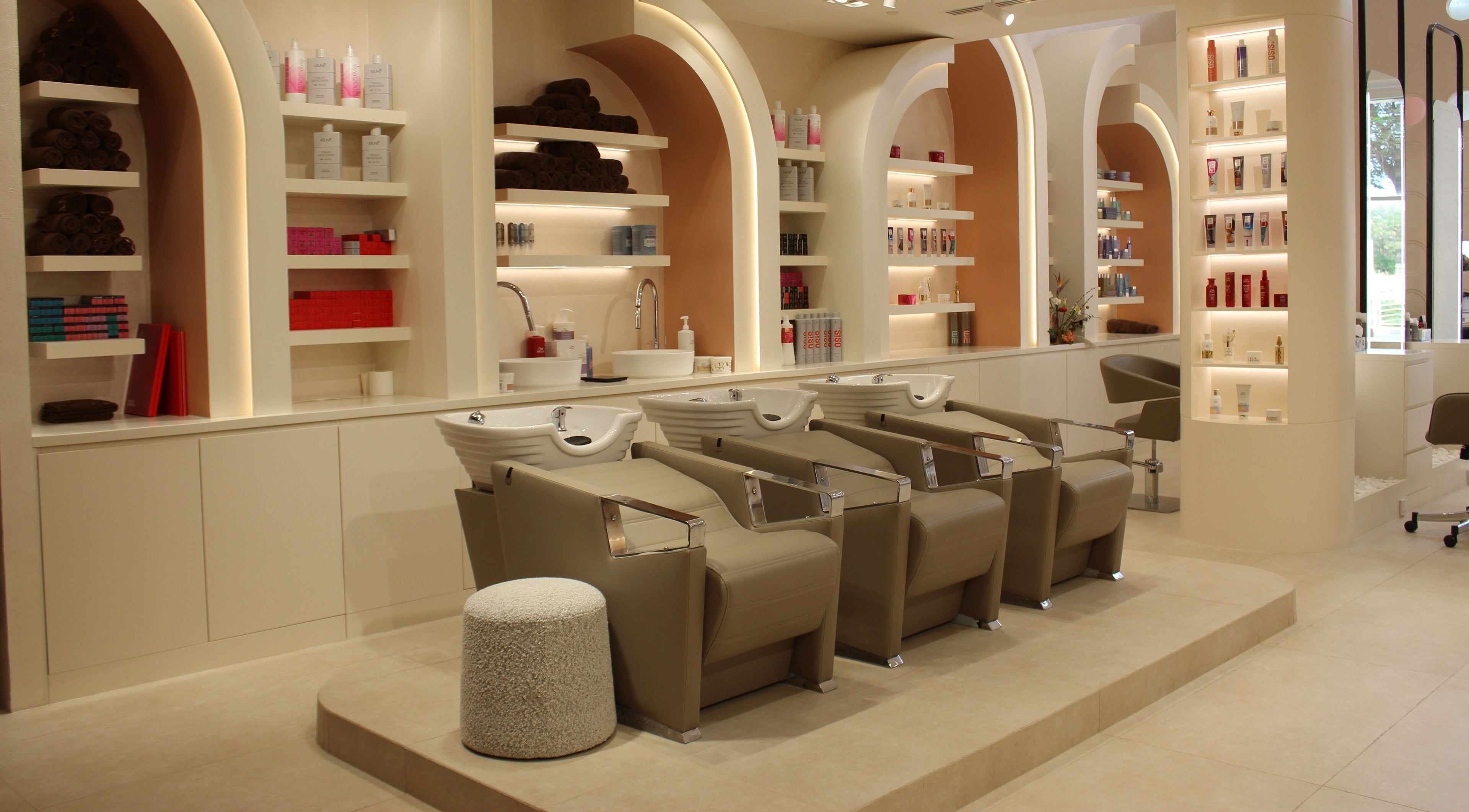 Elegant hair washing stations at Amores Beauty Lounge, Dubai, Dubai, AE showcasing luxury amenities.