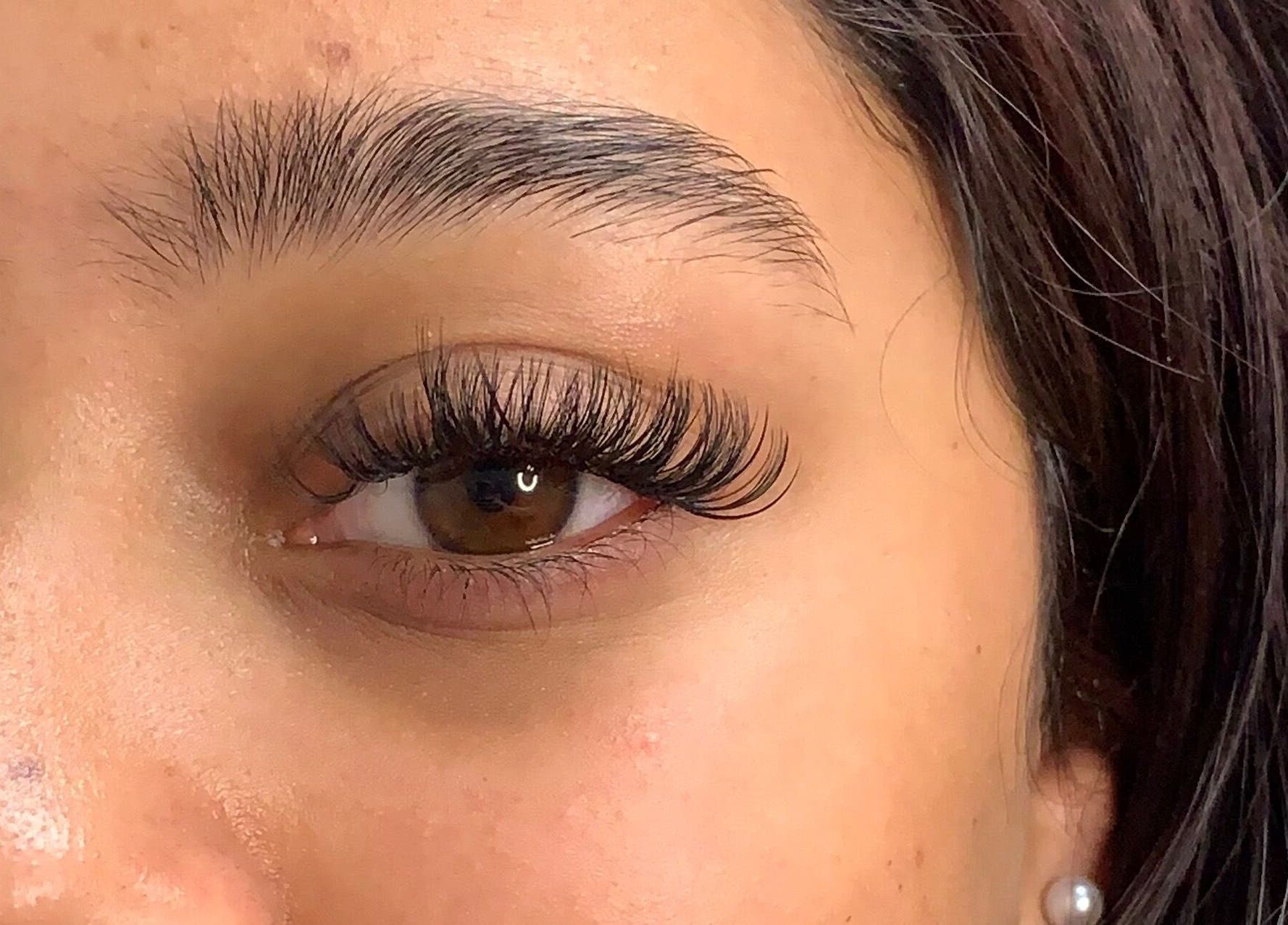 Close-up of stunning eyelash extensions from Lash Me Up! in Cape Town, Western Cape, ZA.