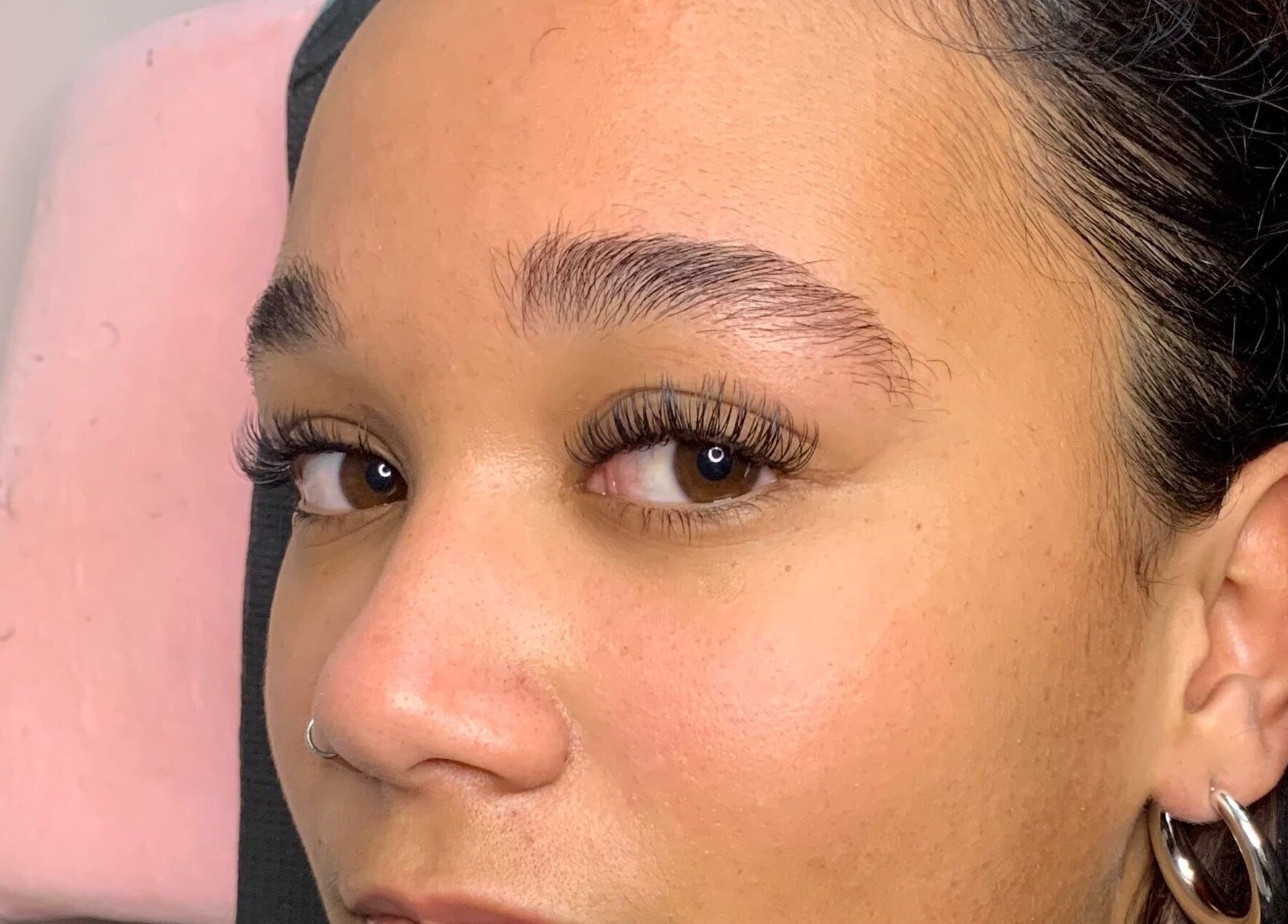 Close-up of a client's eyelash extensions at Lash Me Up!, Cape Town, Western Cape, ZA.