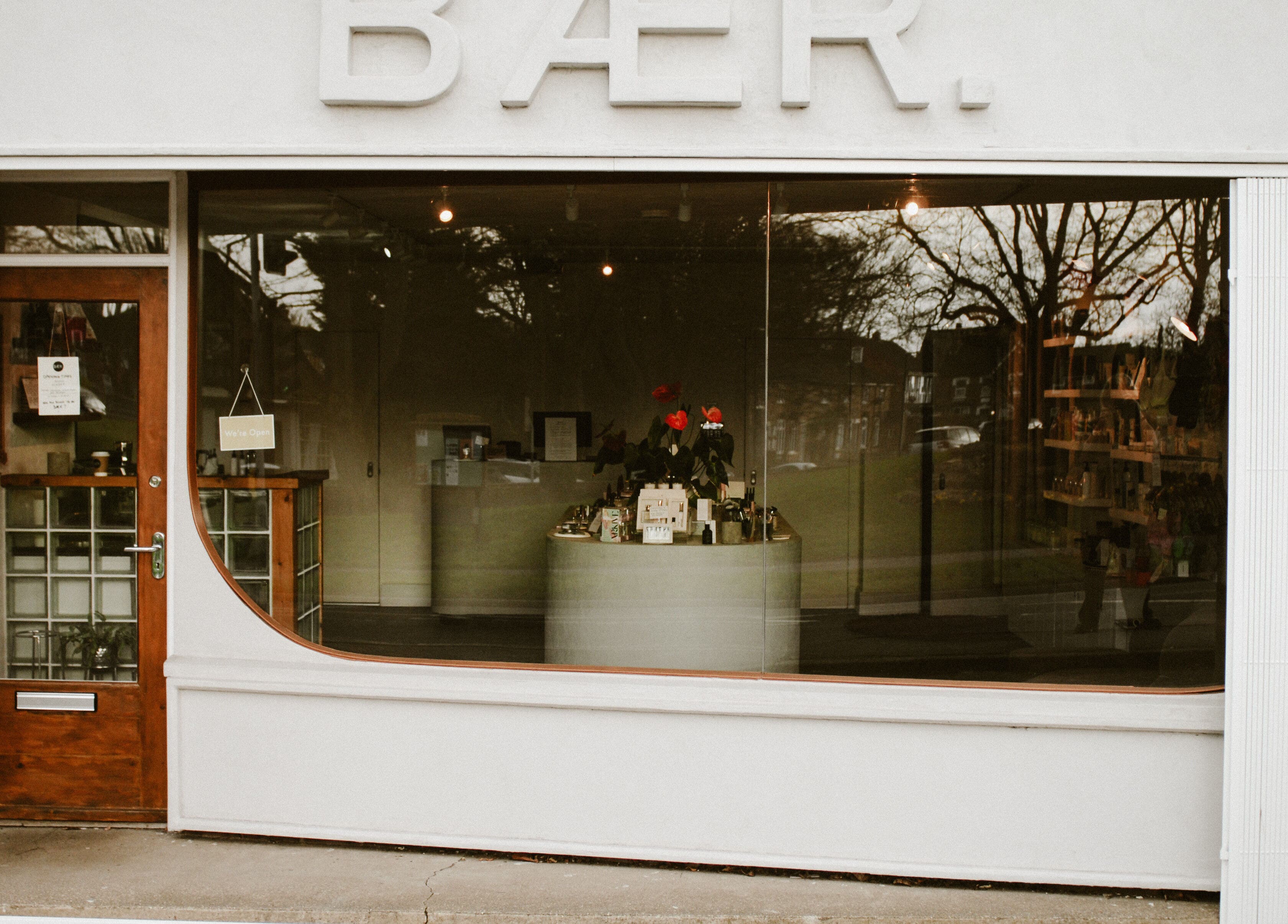 Front view of BAER. beauty and wellness venue in Waltham, England, GB with stylish window display.