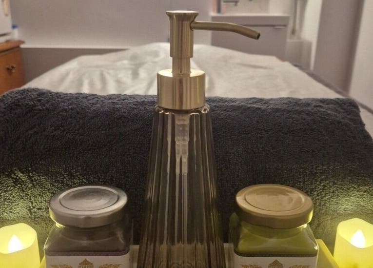Relaxing massage setup at Shewa Thai Massage & Spa, Stoke-on-Trent, England, GB with candles and oils.