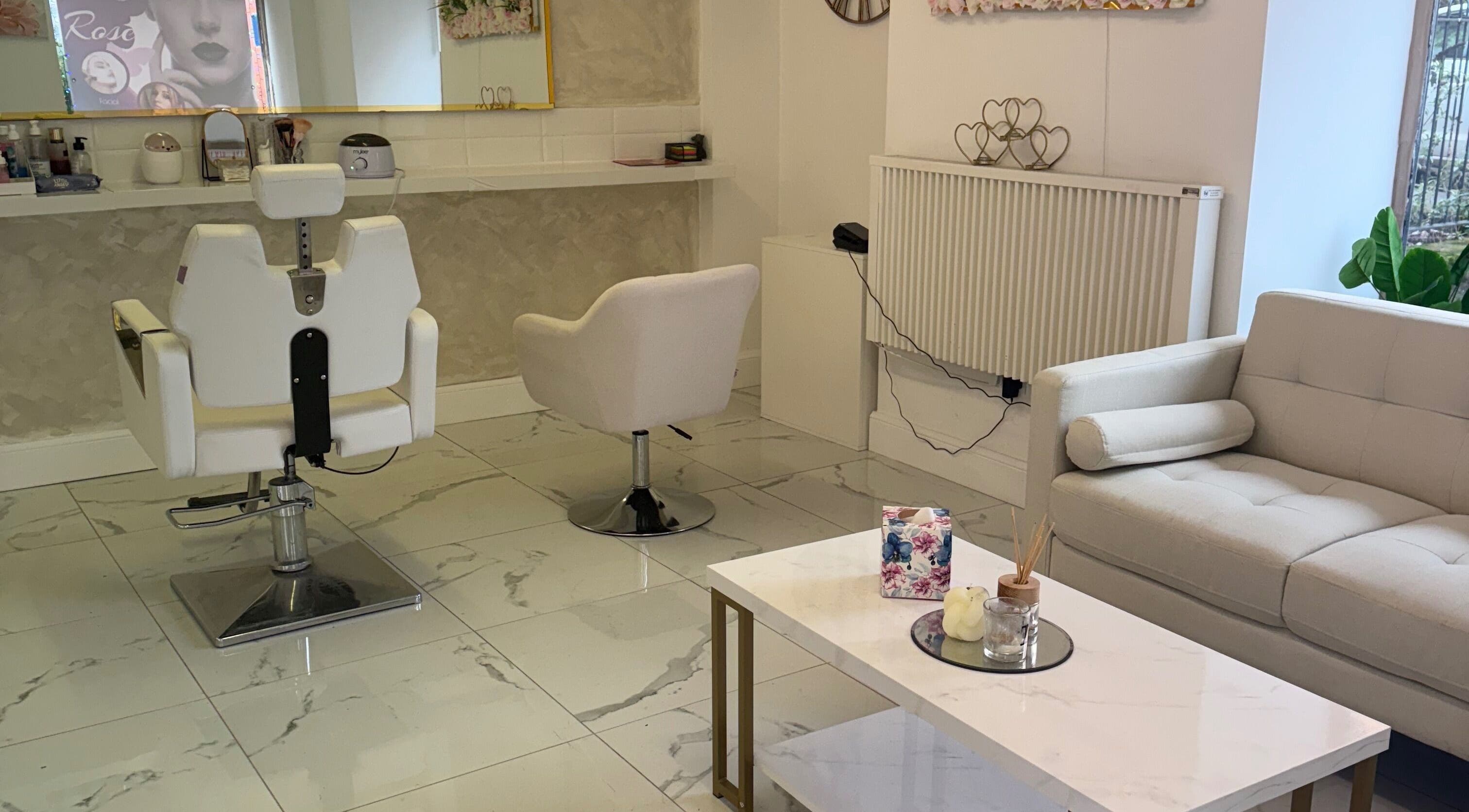 Chic salon interior at Mona, Glasgow, Scotland, GB featuring modern seating and stylish decor.