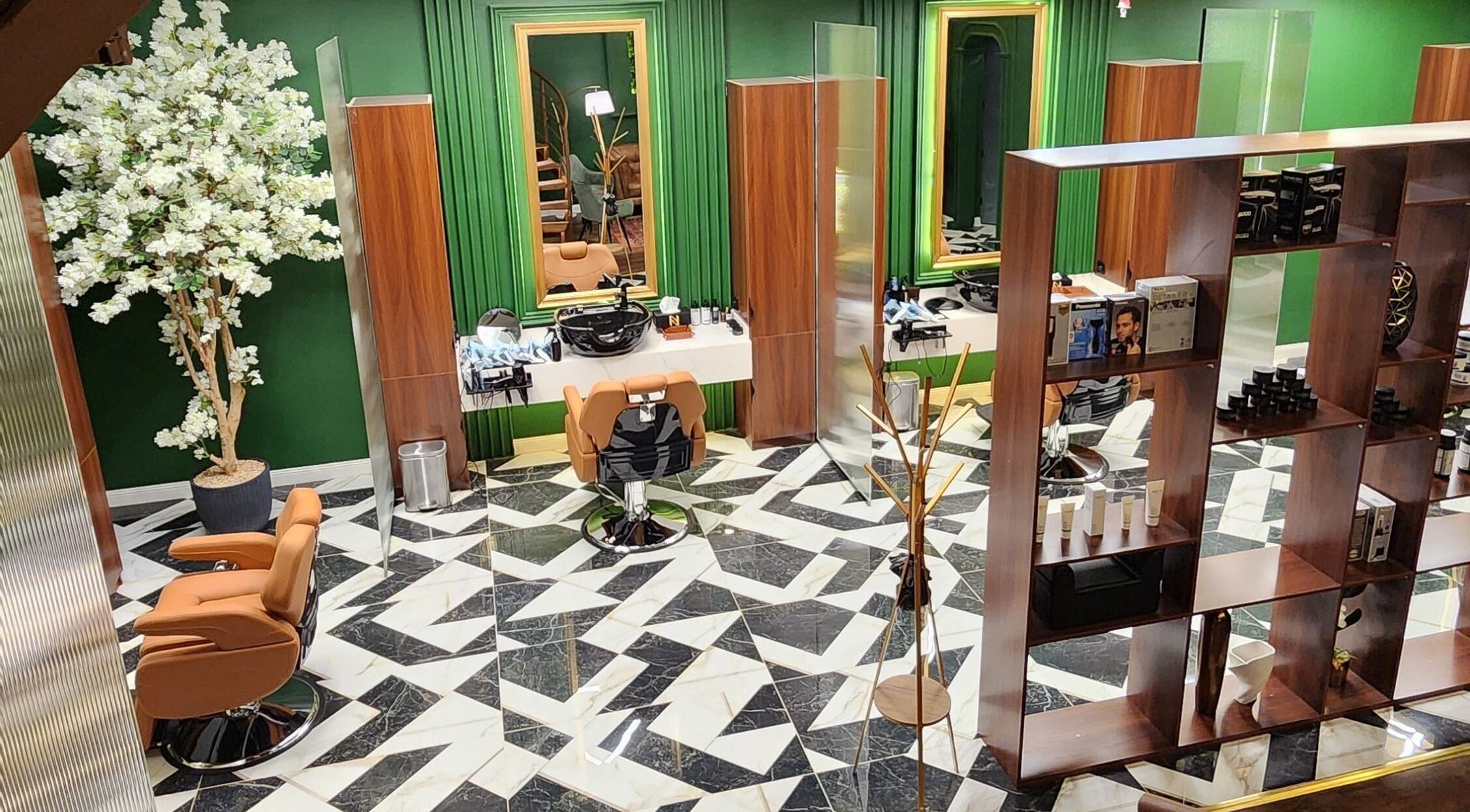 Luxurious salon interior at Noble in Riyadh, Riyadh Province, SA showcasing elegant styling stations.