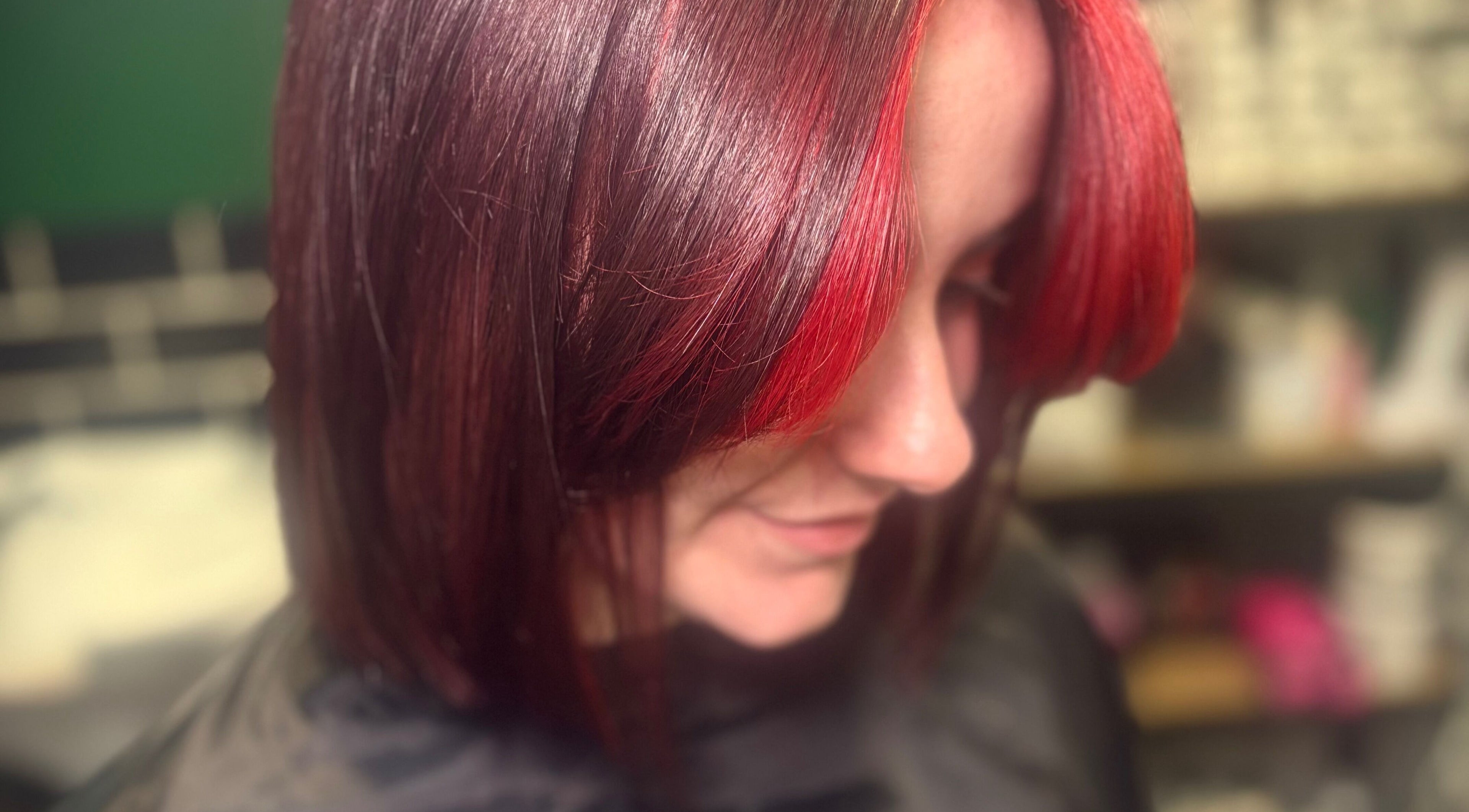 Stylish red-toned hairstyle at Hideaway Hair and Beauty, Llandeilo, Wales, GB.