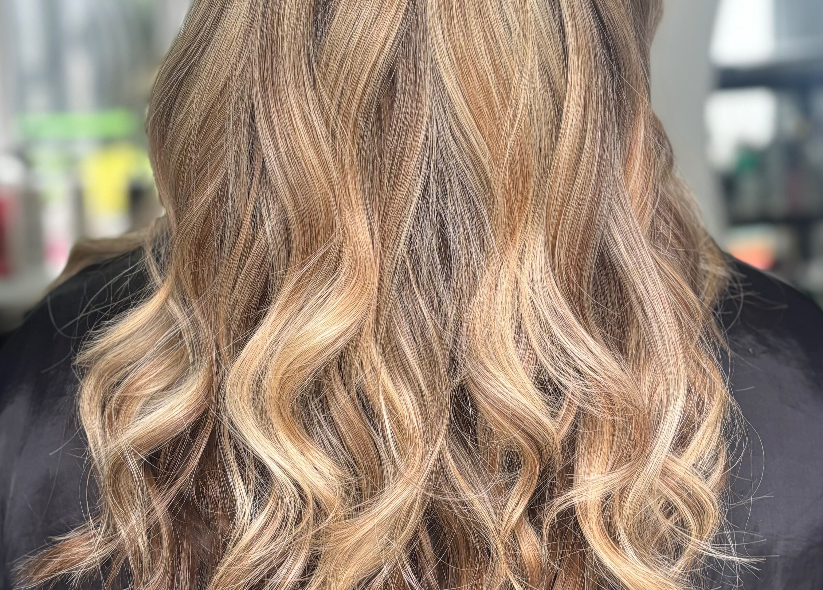 Elegant blonde waves styled at Hideaway Hair and Beauty, Llandeilo, Wales, GB.