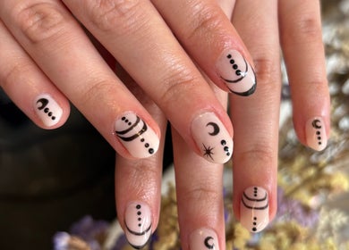 Intricate celestial-themed nail art at Gels by Eleanor in Glasgow, Scotland, GB.