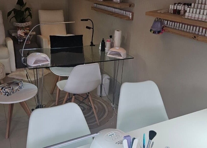 Modern nail station at Dandelion Beauty Studio in Ballito, Kwazulu-natal, ZA with cozy seating and clean decor.