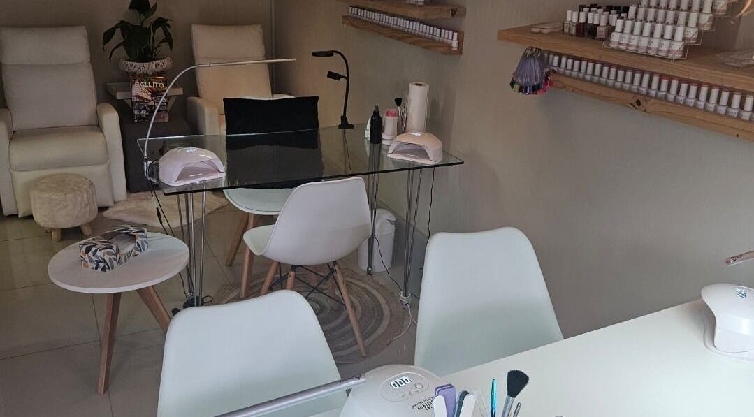 Modern nail station at Dandelion Beauty Studio in Ballito, Kwazulu-natal, ZA with cozy seating and clean decor.