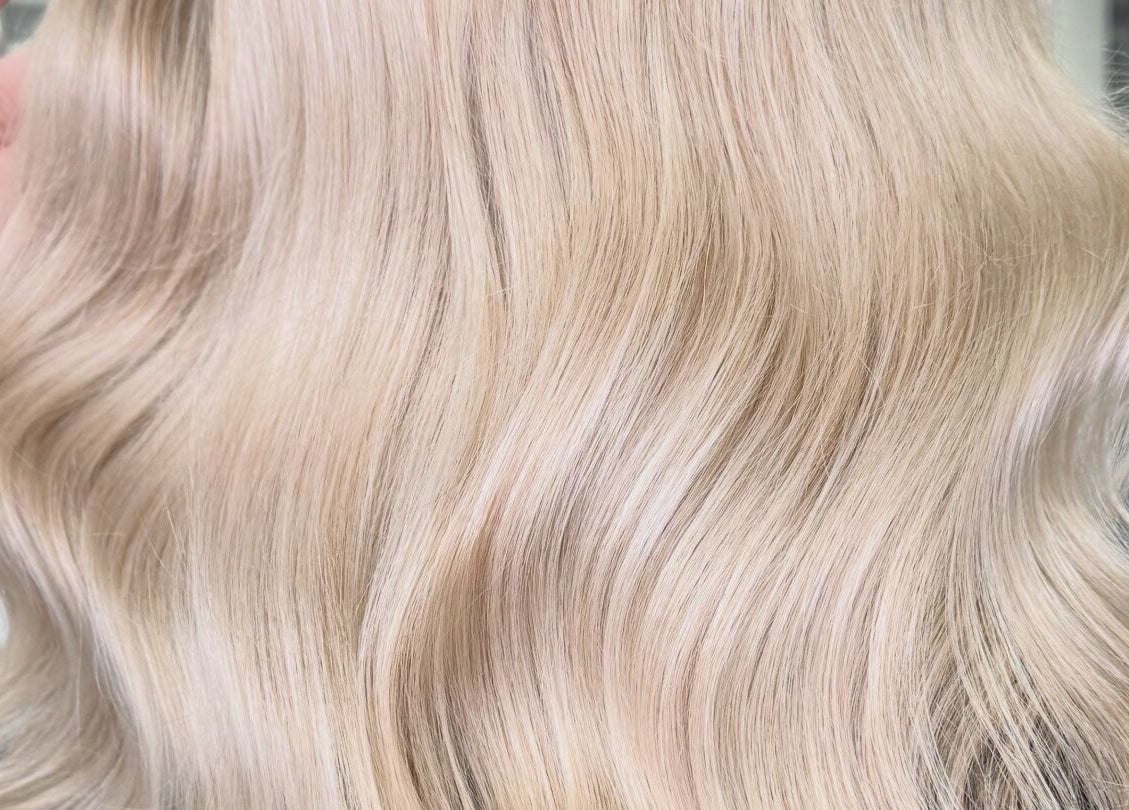 Blonde wavy hair styled at Lucy Rose Hair, Smethwick, England, GB showcasing vibrant shine.