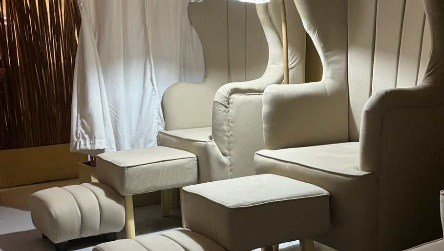 Elegant beige lounge chairs at Relaxa Wellness Spa, City Of Iriga, Bicol, PH, offering serene comfort.