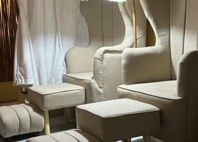 Elegant beige lounge chairs at Relaxa Wellness Spa, City Of Iriga, Bicol, PH, offering serene comfort.