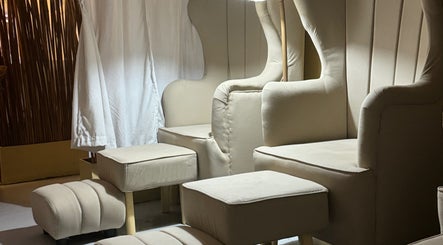 Elegant beige lounge chairs at Relaxa Wellness Spa, City Of Iriga, Bicol, PH, offering serene comfort.