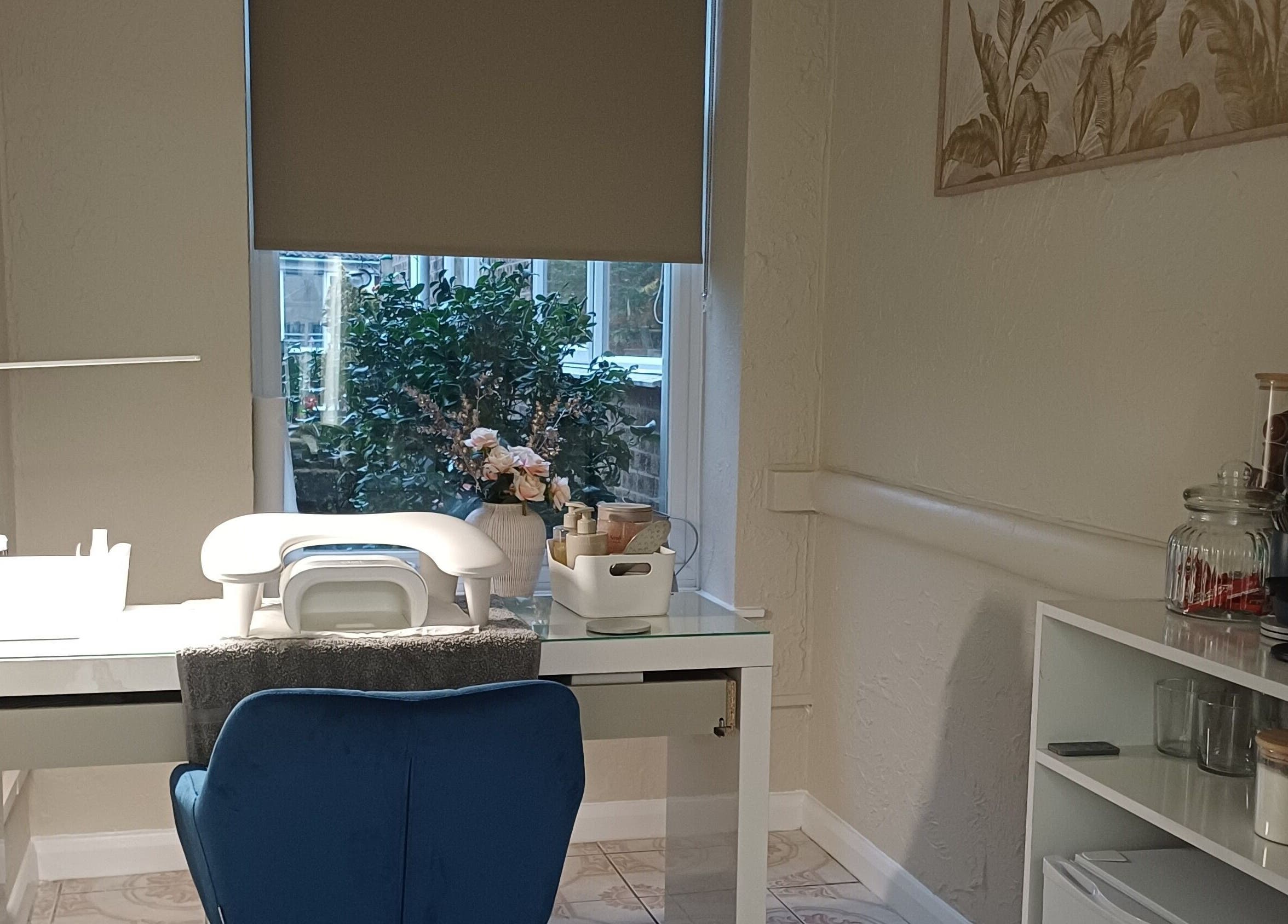 Cozy nail treatment station at Sapphire Beauty in Lowestoft, England, GB, with calming decor and natural light.
