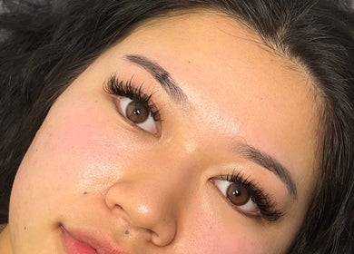 Close-up of elegant eyelash extensions at Luxenhanced, Radcliffe, England, GB showcasing natural beauty.