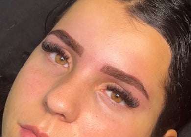 Close-up of styled eyebrows and lashes at luxenhanced, Radcliffe, England, GB. Elegant beauty showcase.