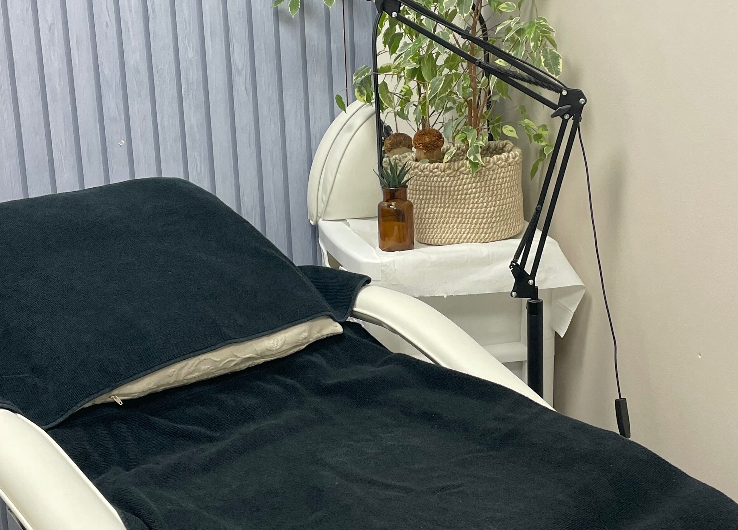 Relaxing treatment bed with plants at Beauteous, Southampton, England, GB spa for ultimate tranquility.