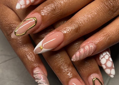 Intricate nail art at Polished by Sarina, Sandton, Gauteng, ZA. Showcasing creative and stylish manicure designs.