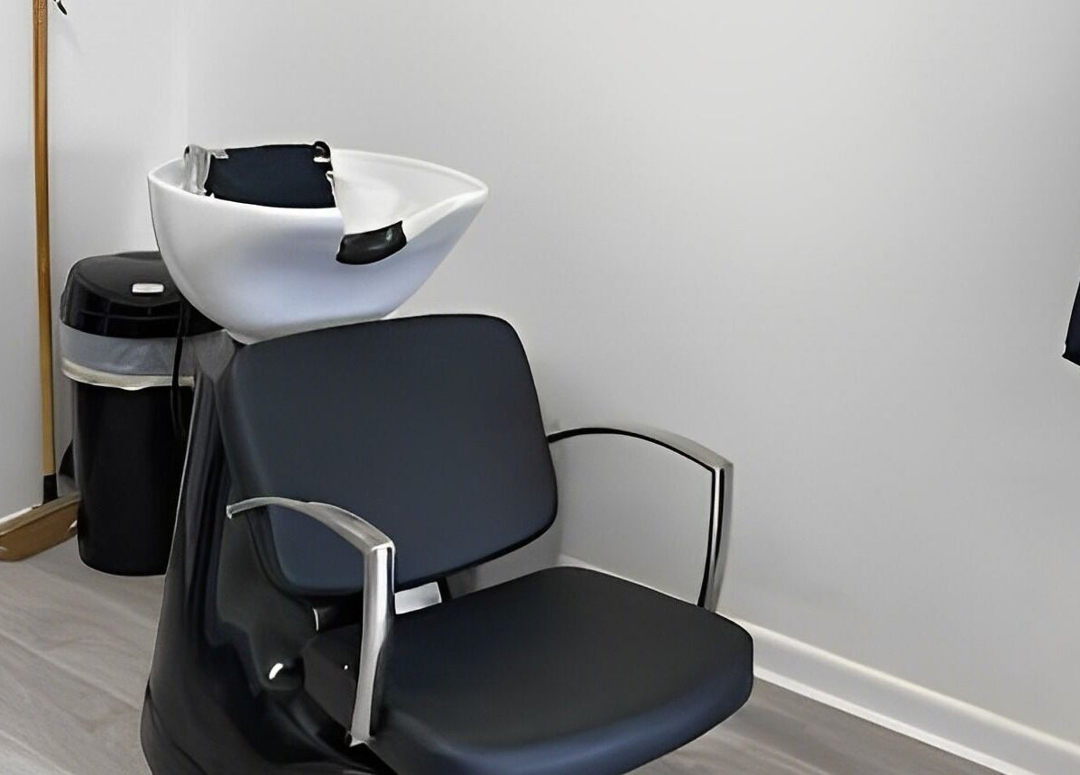 Modern wash station at The Hideaway Salon, Malvern, England, GB. Sleek design in a calming atmosphere.