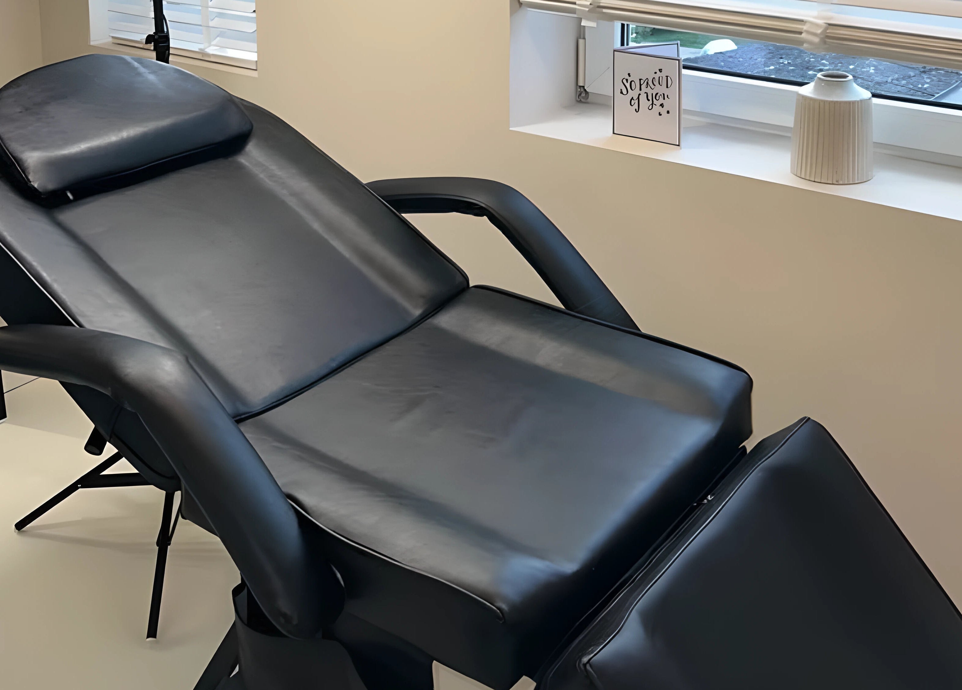 Luxury treatment chair at Caits Beauty Spot in Barry, GB, offering premium comfort and style.