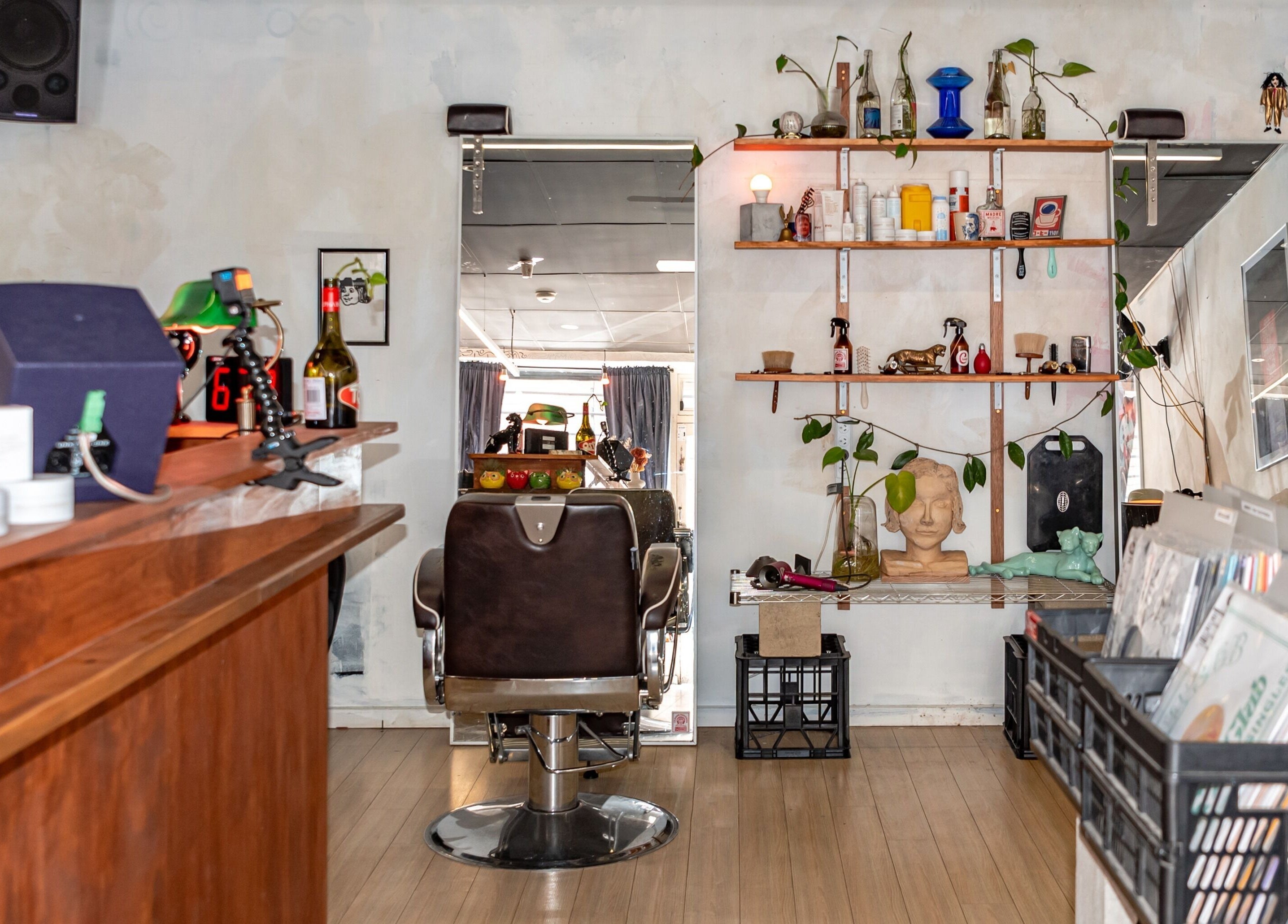 Cozy barber chair with vintage decor at The Royal Moody, Glenelg, South Australia, AU.