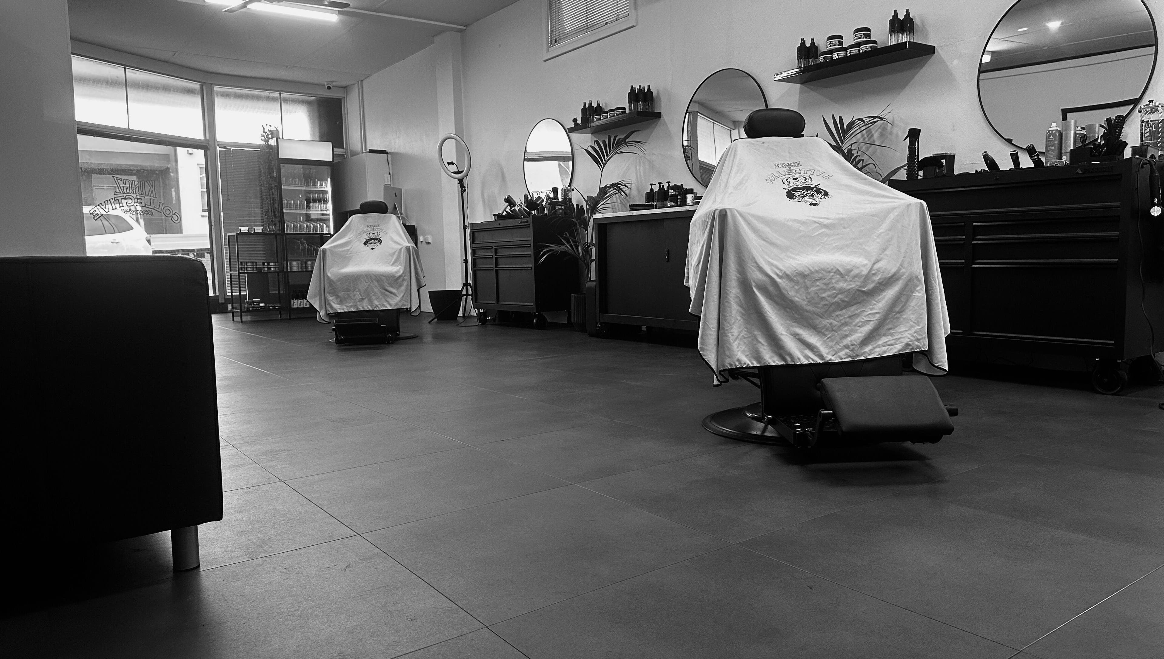 Modern barber chairs at Kingz Collective in Manjimup, Western Australia, AU, showcasing sleek interior design.