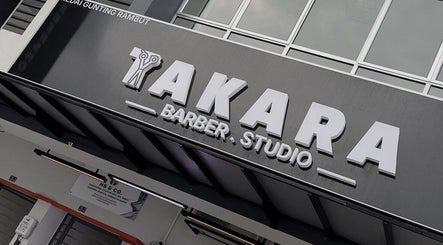 Front view of TAKARA BARBERSHOP in Puncak Alam, Selangor, MY, showcasing the stylish exterior signage.