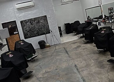 Interior of TAKARA BARBERSHOP in Puncak Alam, Selangor, MY showcasing modern chairs and mirrors.