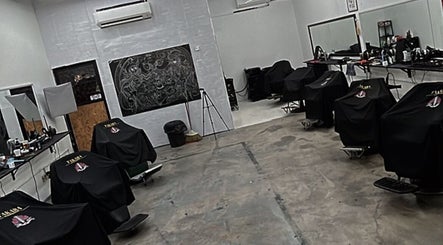 Interior of TAKARA BARBERSHOP in Puncak Alam, Selangor, MY showcasing modern chairs and mirrors.