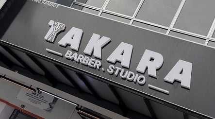 TAKARA BARBERSHOP signage at Puncak Alam, Selangor, MY, featuring modern and stylish design.