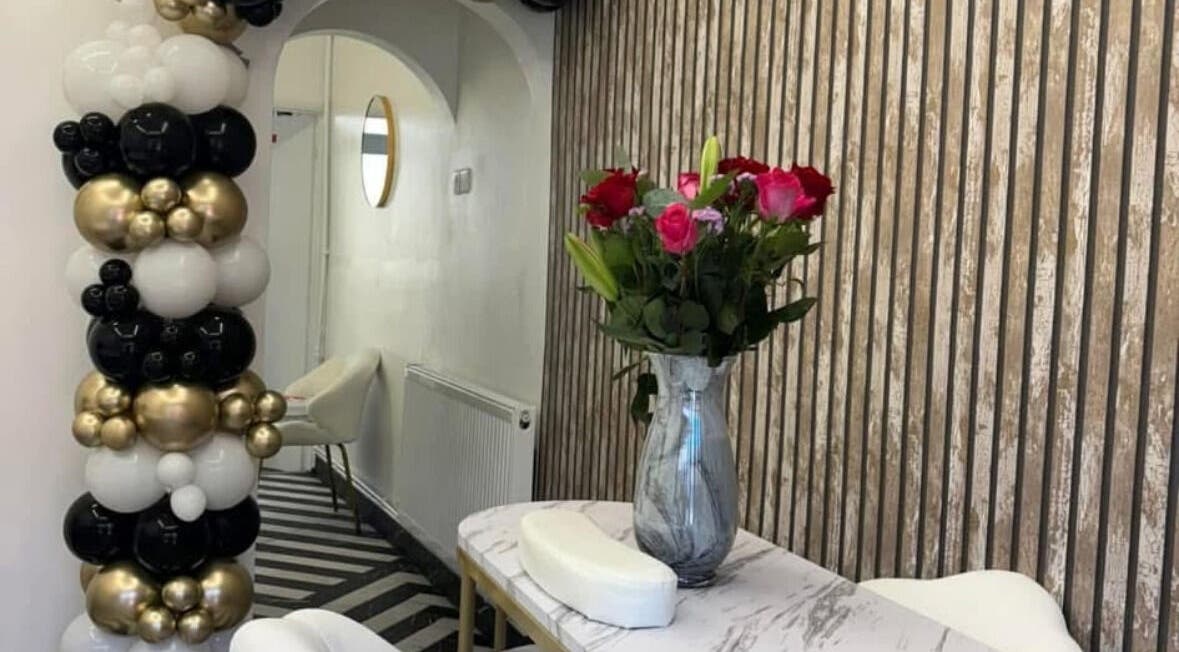 Stylish interior of T H Nails in Barnsley, England, GB with floral and balloon decor.