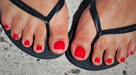 Vibrant red pedicure at Polished Perfection by Marilyn, Cape Town, Western Cape, ZA.