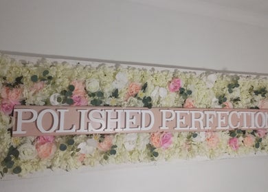 Polished Perfection by Marilyn signage surrounded by floral decor in Cape Town, Western Cape, ZA.
