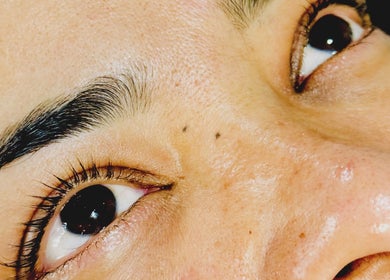 Close-up of perfectly shaped eyebrows at F & G Beauty, London, England, GB.
