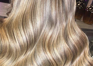 Glossy blonde waves styled at Hair by Chelsea, Clydebank, Scotland, GB.
