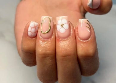Stylish manicure with floral and gold designs at Izzy’s beauty room 🤍, Gorseinon, Wales, GB.