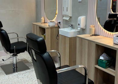 Modern beauty stations at Lash & Brows Palace in Clarkson, Western Australia, AU, with sleek chairs and mirrors.