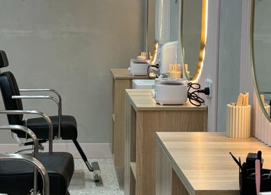 Elegant salon chairs and lit mirrors at Lash & Brows Palace in Clarkson, Western Australia, AU.