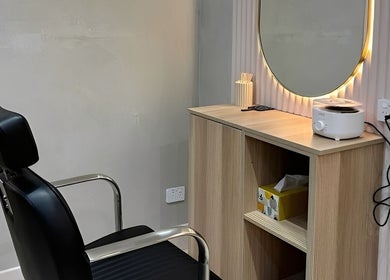 Luxe styling station at Lash & Brows Palace, Clarkson, Western Australia, AU, featuring a lit mirror and chair.