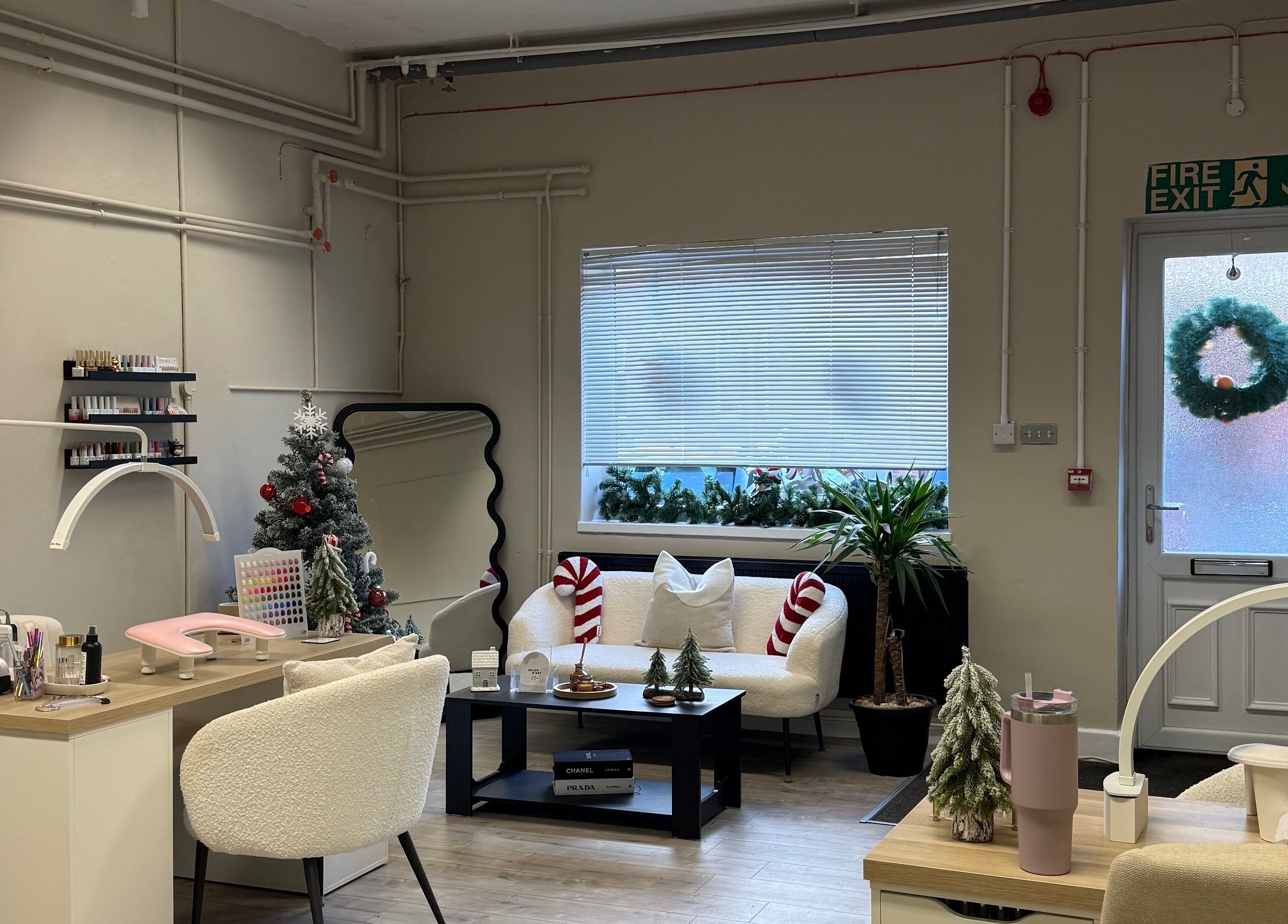 Festive interior of Lashes by Katie in Nantwich, England, GB, featuring chic decor and comfortable seating.