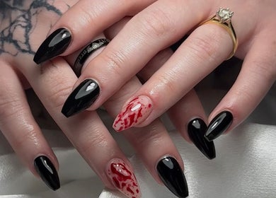 Elegant black and red nail art at Medusa’s Mantra, Greenbank, Queensland, AU.
