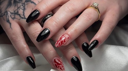 Elegant black and red nail art at Medusa’s Mantra, Greenbank, Queensland, AU.