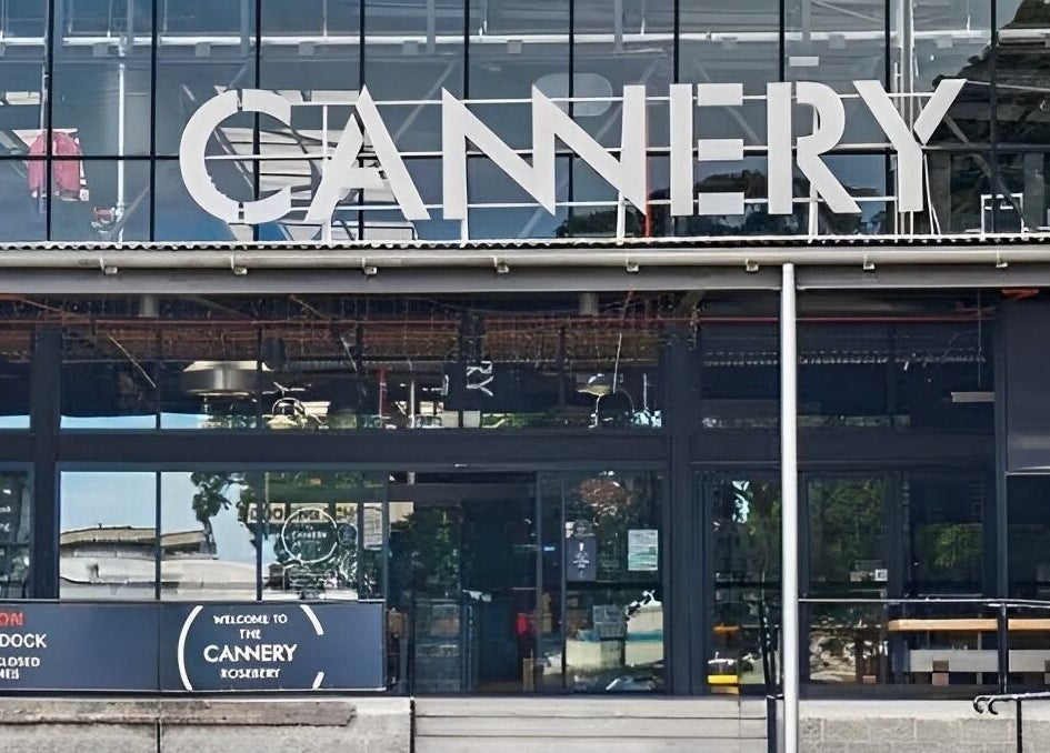 Facade of Tapperdon Barbershop at Cannery in Rosebery, New South Wales, AU, showcasing modern architecture.