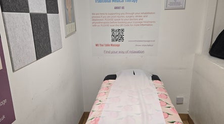 Tranquil therapy room at WS Thai Table Massage in Croydon, England, GB, featuring a peach-patterned massage table.