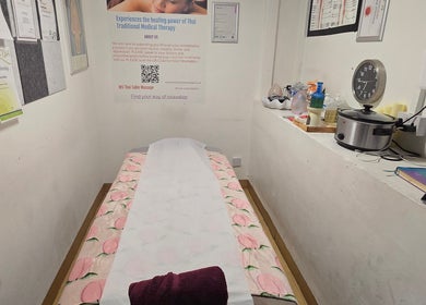 Serene massage room at WS Thai Table Massage, Croydon, England, GB, showcasing a comfortable therapy setting.