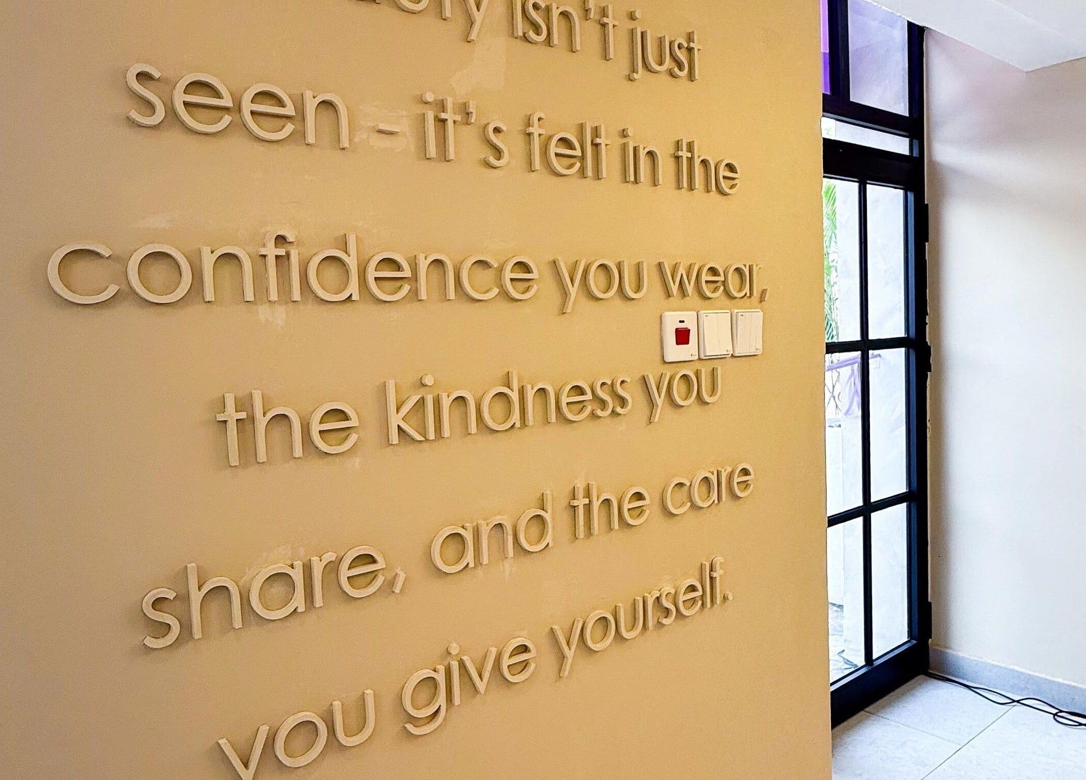 Inspiring wall art at Polish’d Nails and Beauty Bar, Accra, Greater Accra Region, GH, enhances the tranquil ambiance.